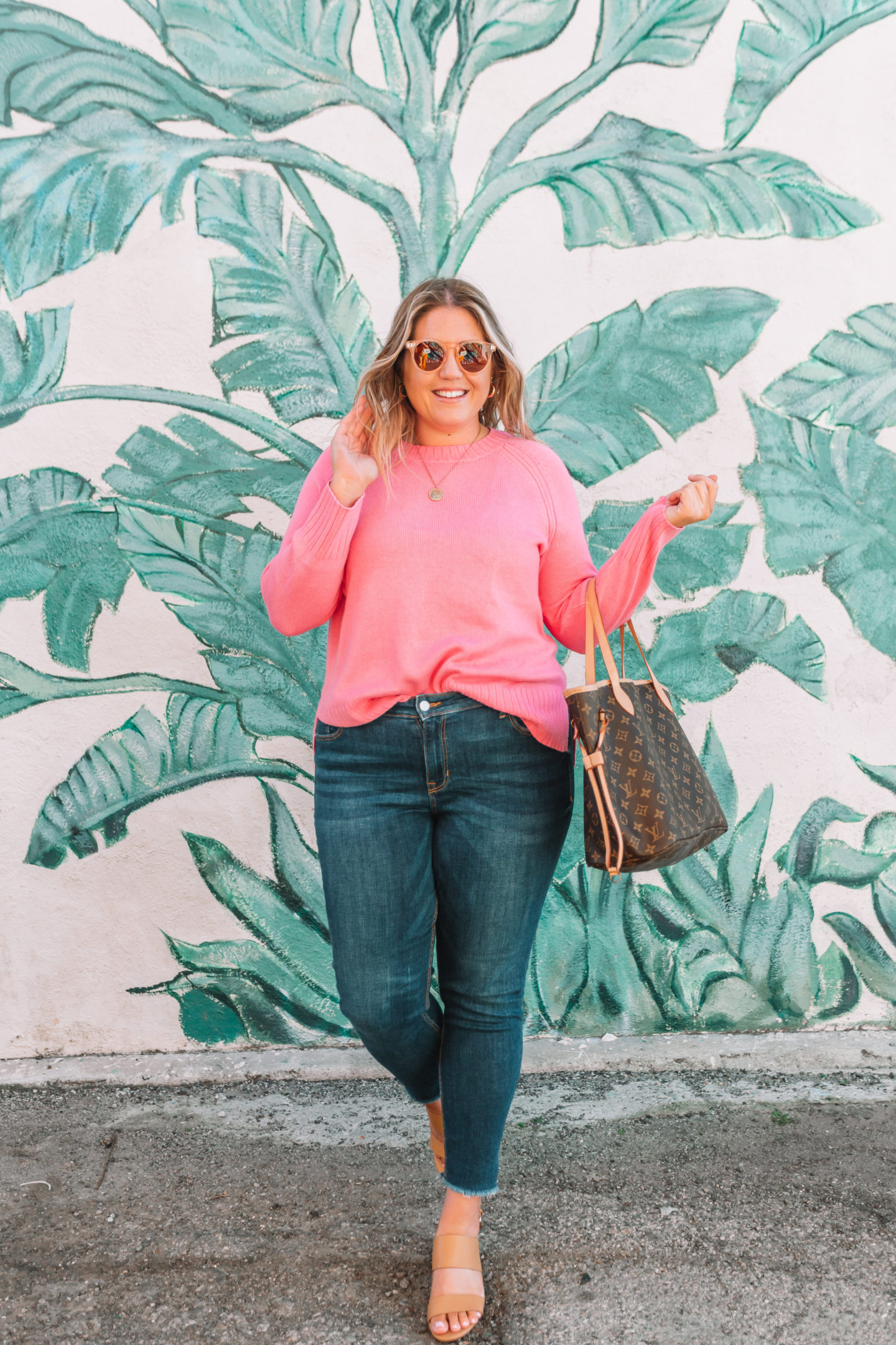 pink sweater, casual spring outfit, palm leaf wall venice beach