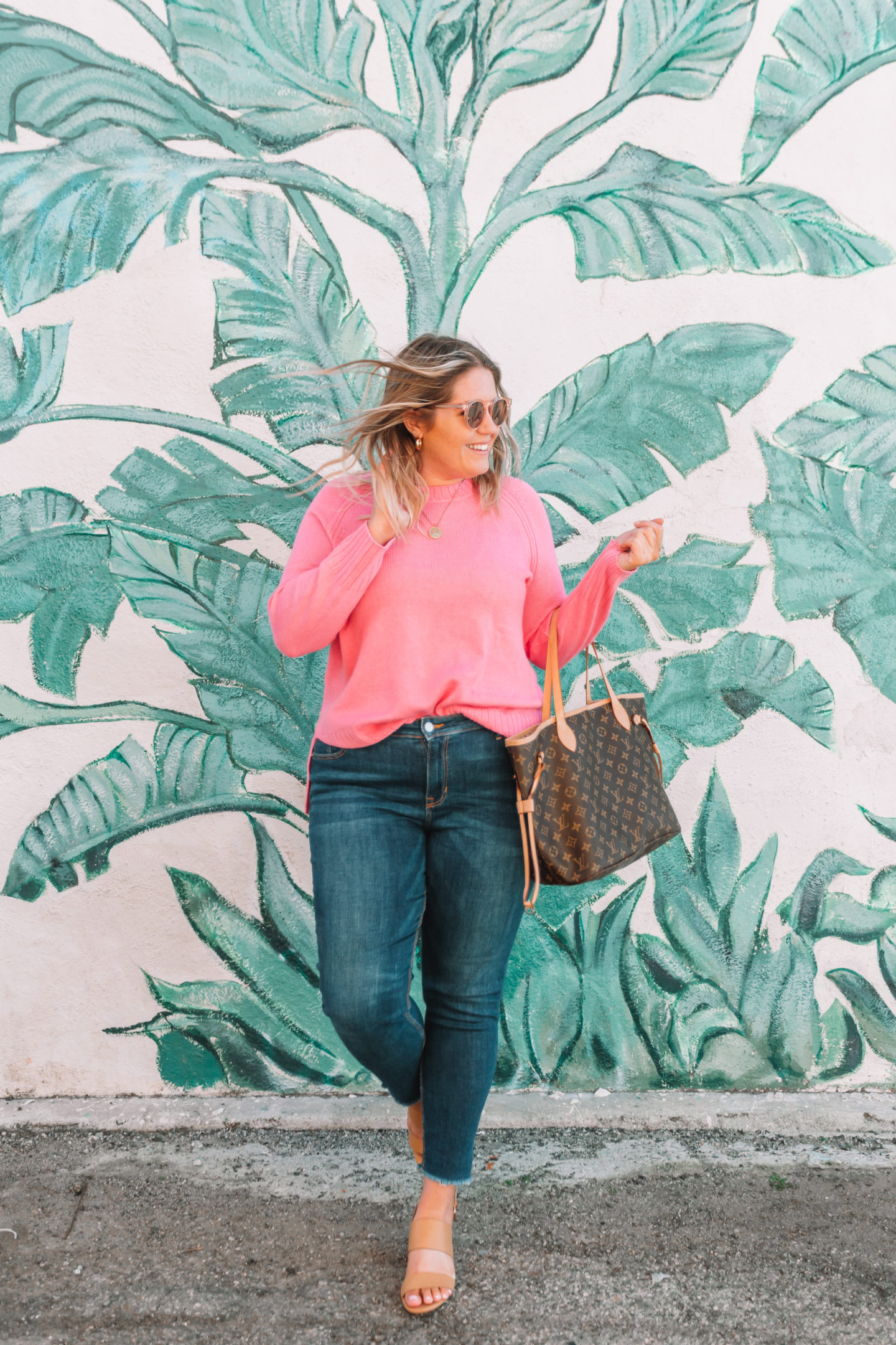pink sweater, casual spring outfit, palm leaf wall venice beach