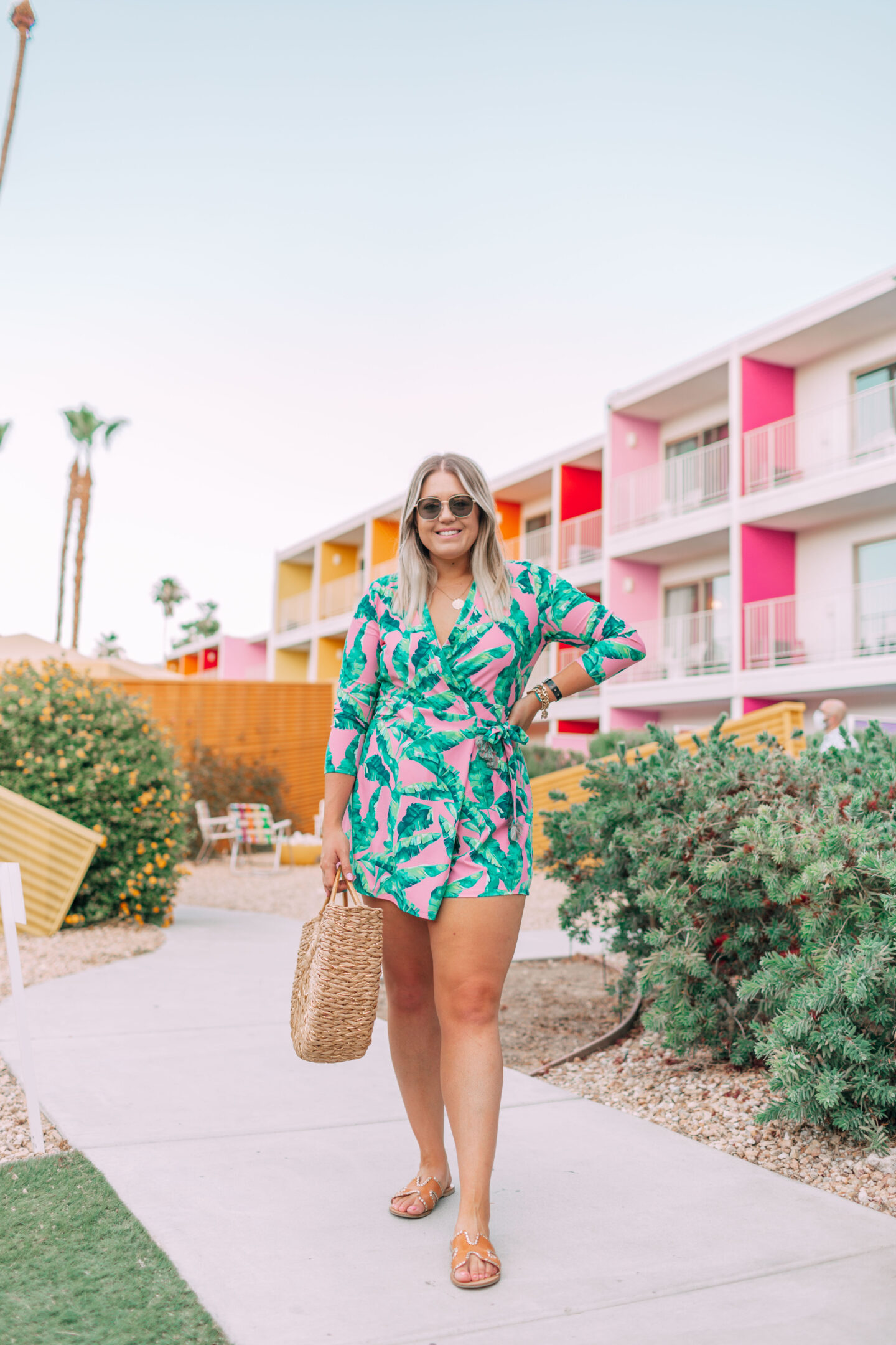 pink palm print romper dress in palm springs