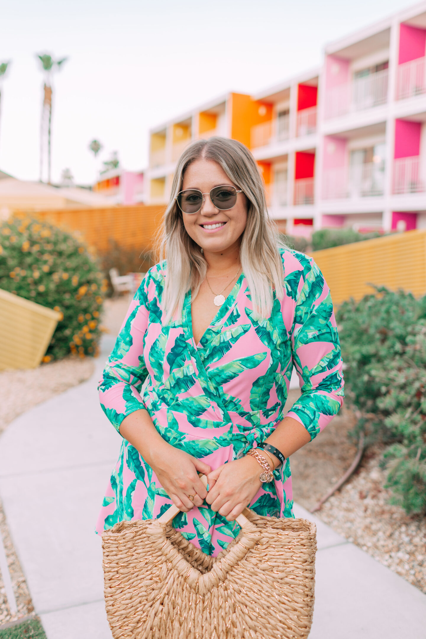 pink palm print romper dress in palm springs